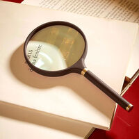 Pebble Archival Magnifying Glass Brown assouline pebble archival magnifying glass brown
