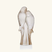 لاليك منحوتة صغيرة على شكل ببغاوين باللون الذهبي