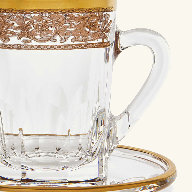 ماريو تشيوني فنجان شاي مع صحنه باللون الشفاف