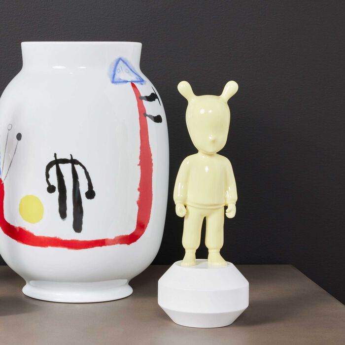 lladro the guest figurine small yellow